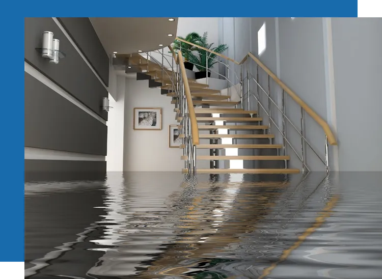 Flooded interior with water covering the floor beneath a staircase